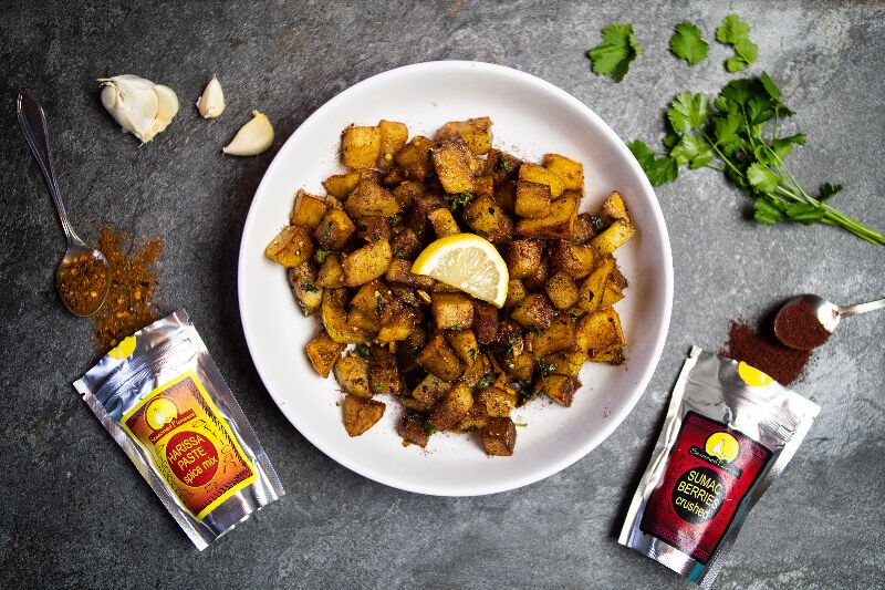 Lebanese spicy paptates Batata Harra seasoned with seasoned pioneers harissa and suma