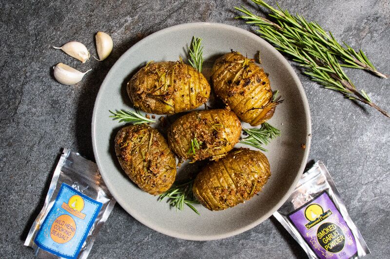 Hasselback potatoes made with seasoned pioneers smoked garlic powder and rosemary